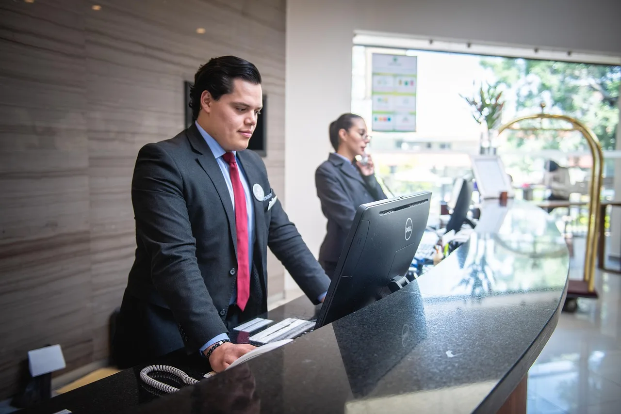 receptionist, man, hotel, work, attention, reception, lobby, person, necktie, employee, company, professional, assistance, receptionist, receptionist, receptionist, receptionist, receptionist, hotel, reception. Common hospitality reputation management questions