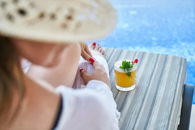 woman, resort, hotel, holiday, ocean, girl, sea, beach, trip, sun, coast, white, beauty, nature, tropical, drink, cocktail, pool, relax, hat, wicker, beautiful, summer. FTC endorsement guides for hospitality influencers, an overview