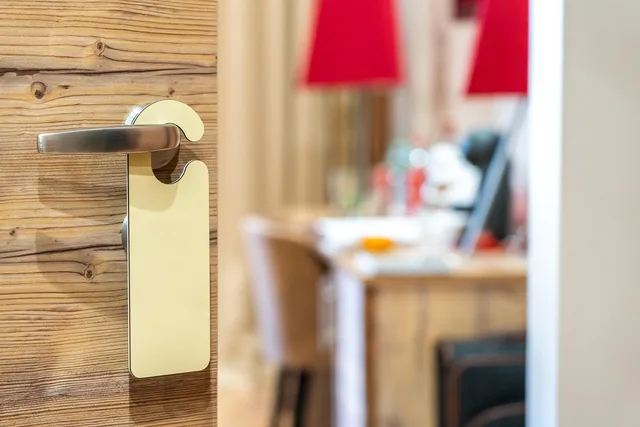 hotel, privacy, room, sign, door handle, travel, motel, entrance, service, door knob, tag, copy space. Hospitality reputation management: the version that survives contact with reality