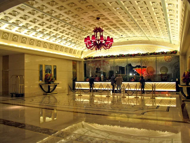 Galaxy Macau Hotel Reception. Hotel Upsell Software for Canadian Properties: Pre-Arrival, Upgrades, Late Checkout